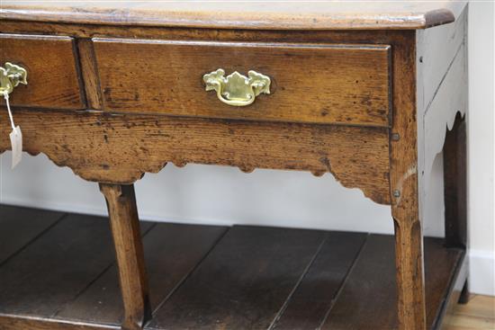 An 18th century oak dresser, W.5ft 1in. H.6ft 5in.